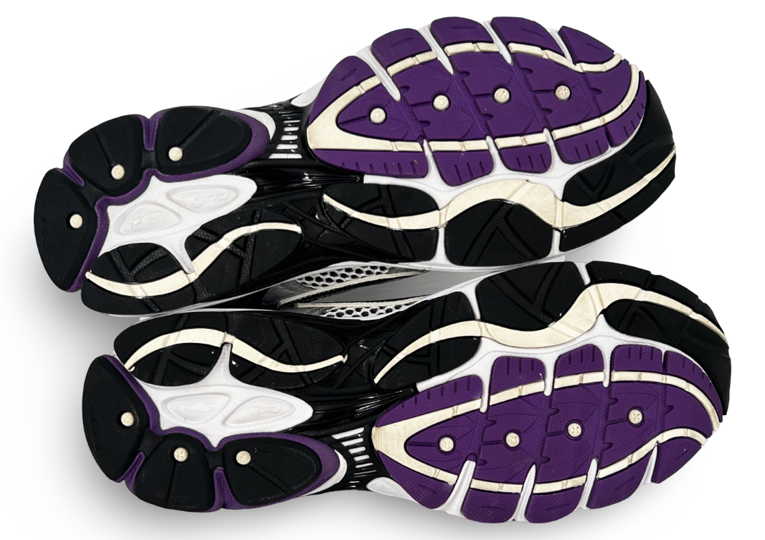 Saucony ProGrid Omni 9
White Black Silver Purple
