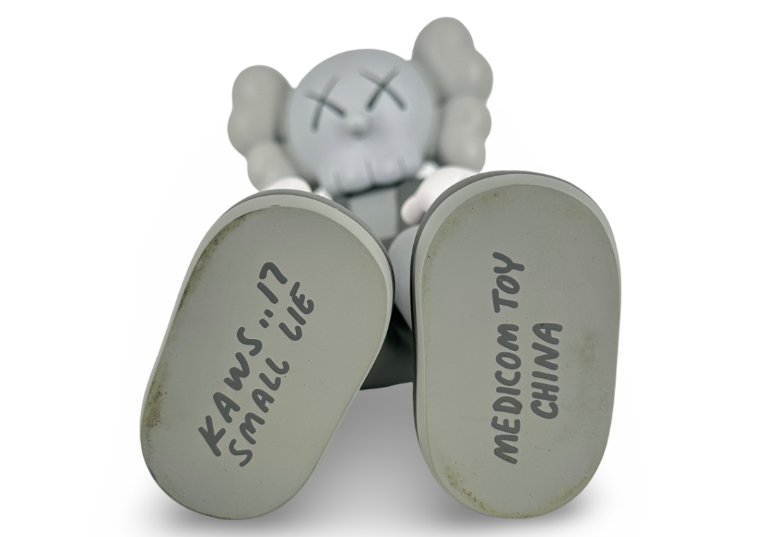 KAWS Small Lie Companion Vinyl Figure Grey